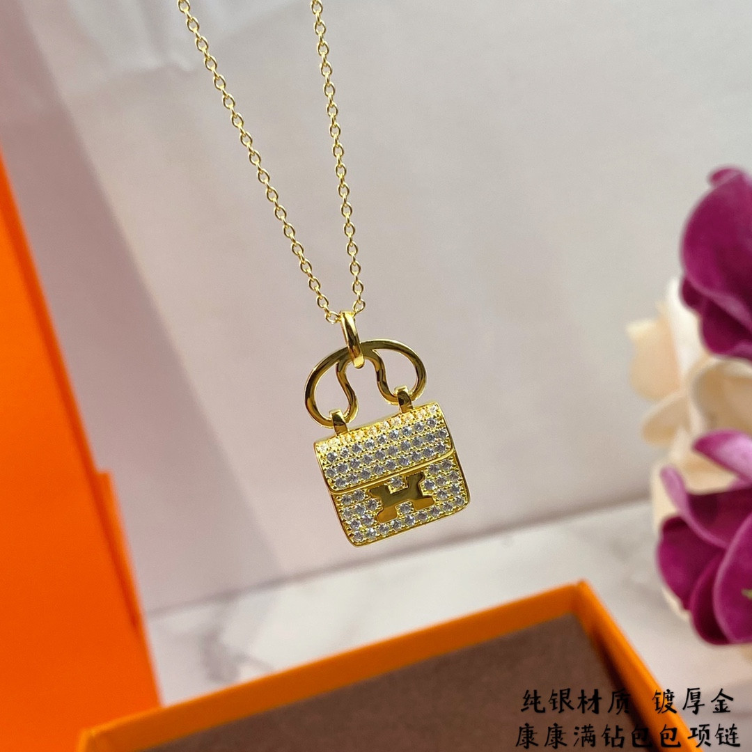 hermès fully Di*m*nd-encrusted h bag necklace