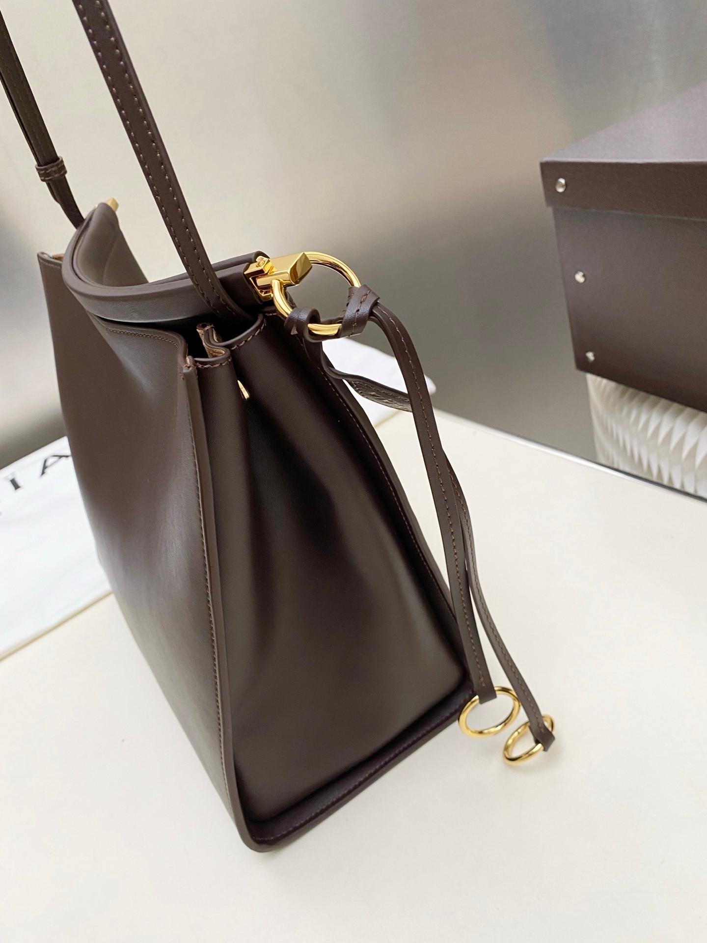 ALAÏA LE CLICK SQUARE BAG IN NUBUCK 26x14x24cm