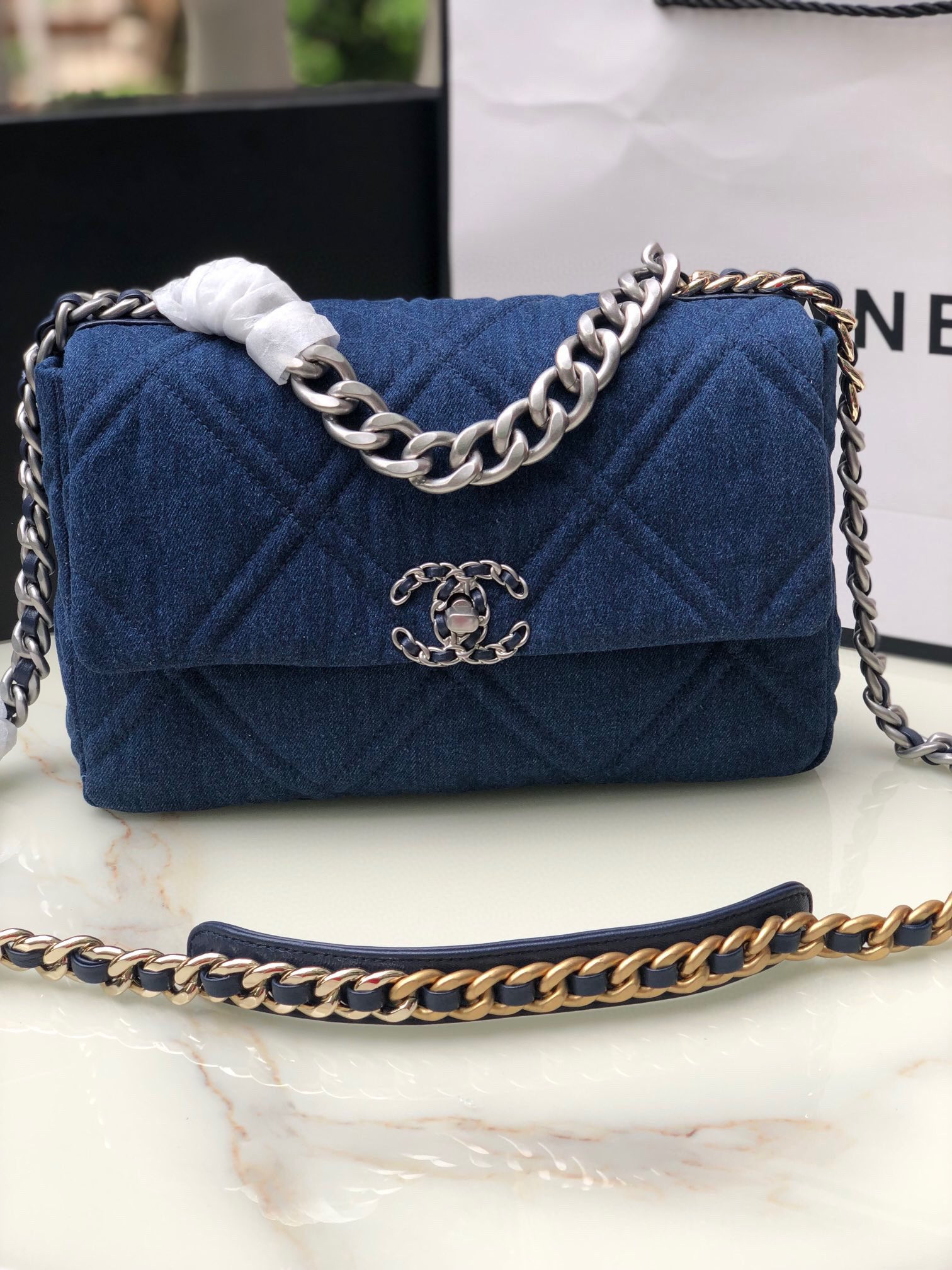 Ch*el 19 large handbag, gold-tone, silver-tone & ruthenium-finish metal blue 7.8 × 11.7 × 3.9 in