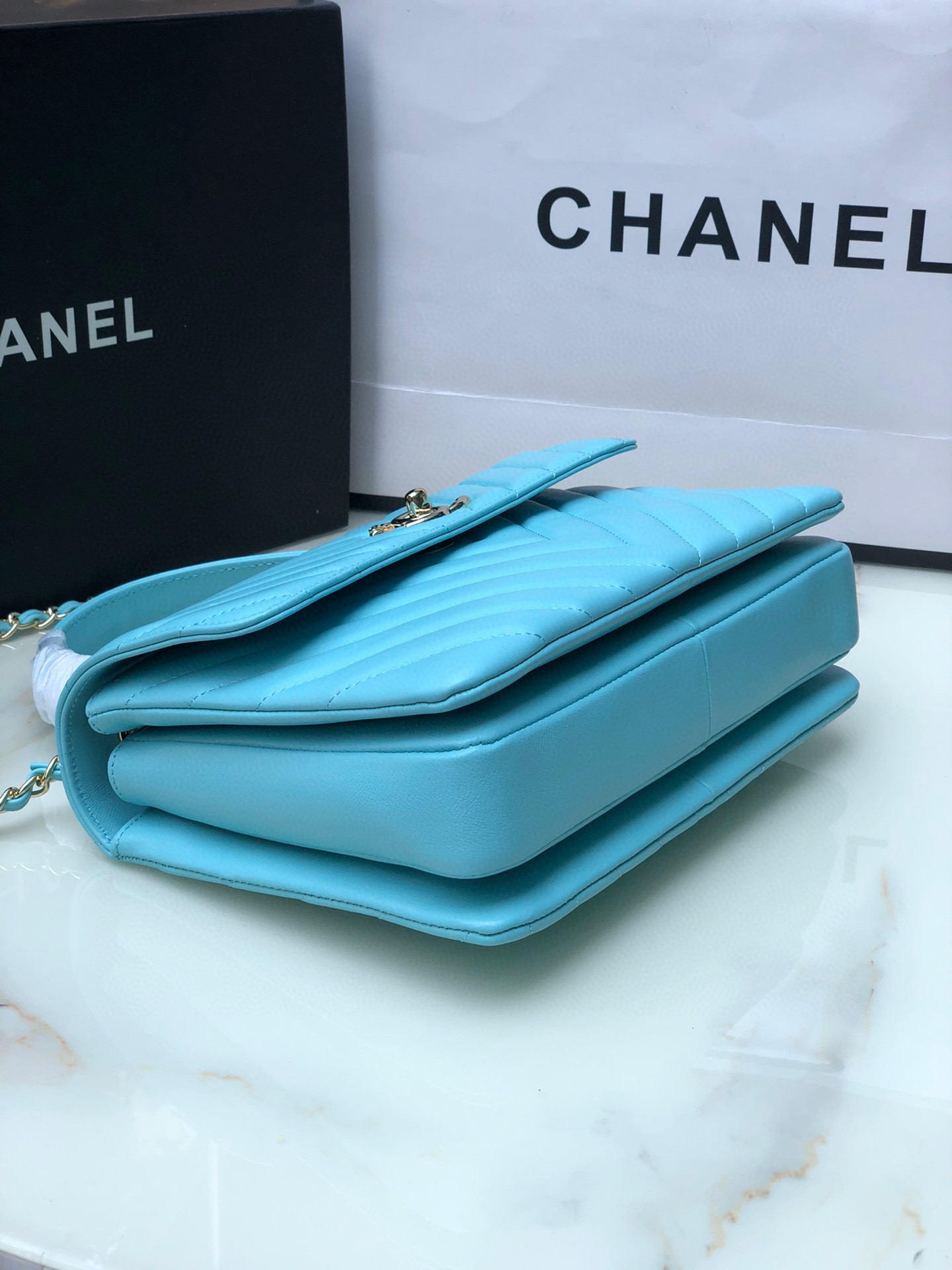 Ch*el flap bag with top handle 6.6 × 9.8 × 4.7 in