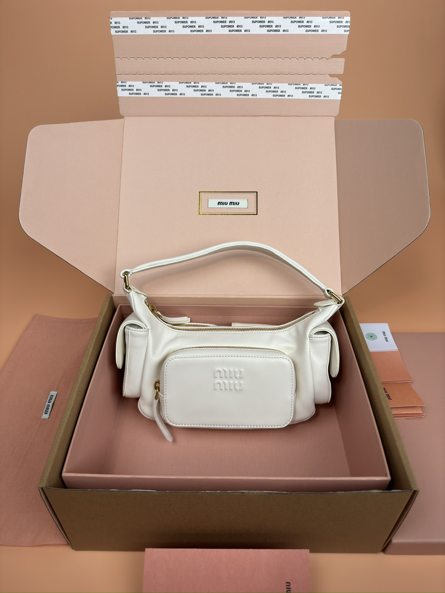 Miu Miu Hobo Nappa leather pocket bag 12x21x6cm