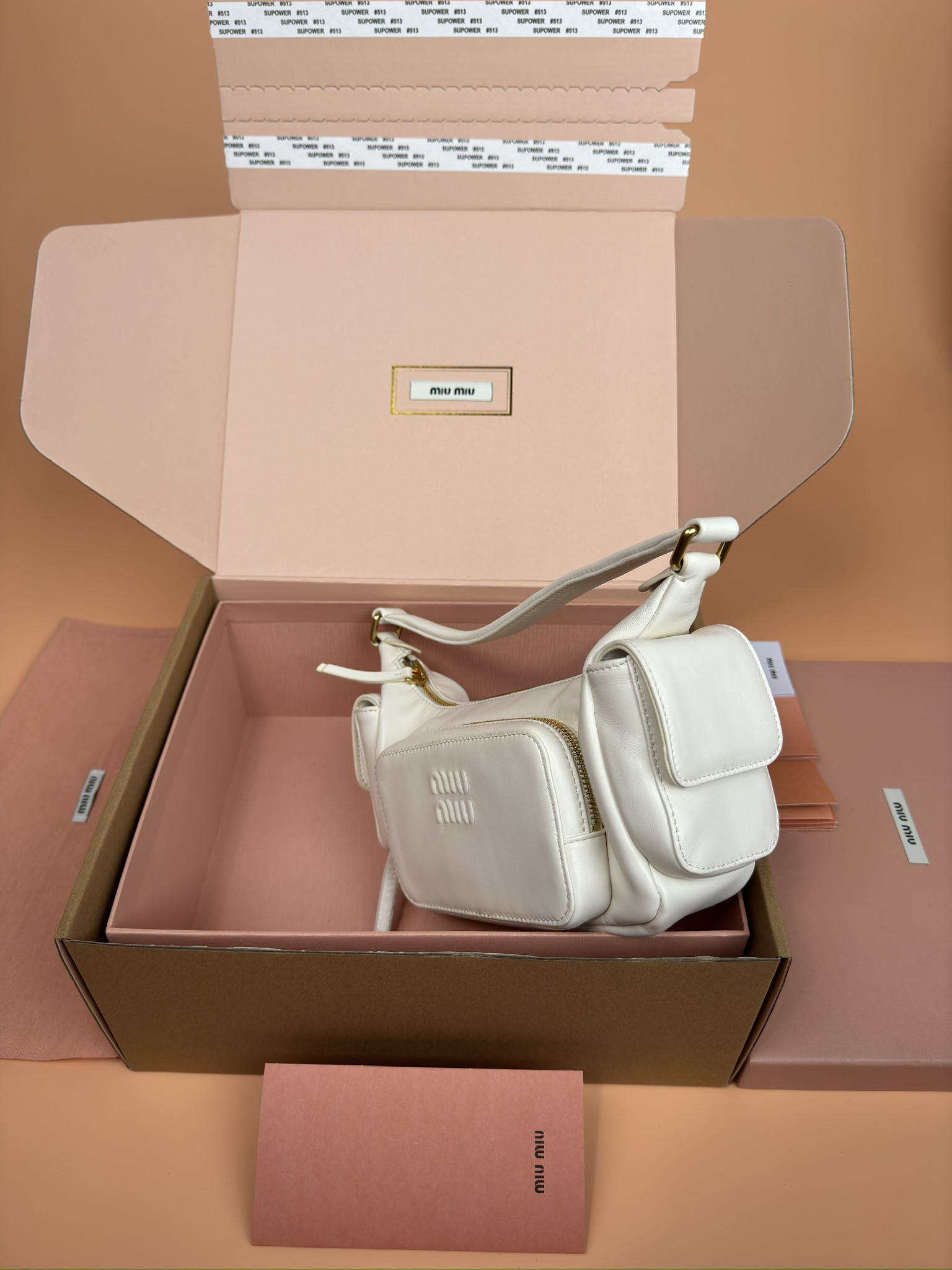 Miu Miu Hobo Nappa leather pocket bag 12x21x6cm