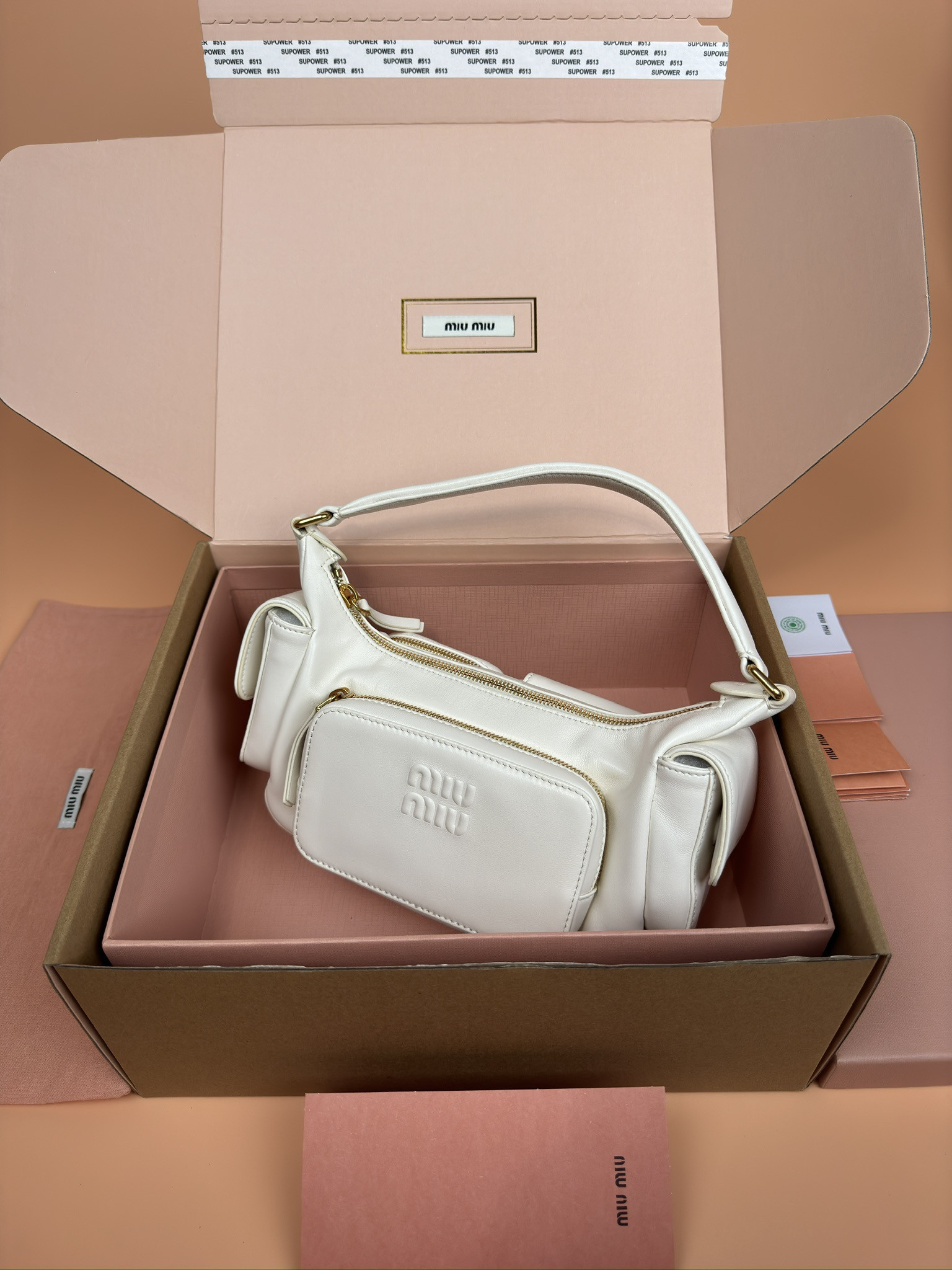 Miu Miu Hobo Nappa leather pocket bag 12x21x6cm